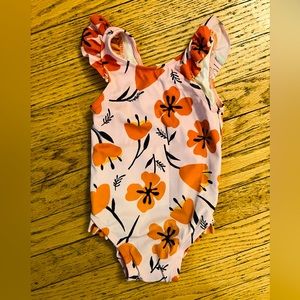 Hanna Andersson One Piece Swimsuit. VGUC. Size 12-18 mo. Light pink w orange.